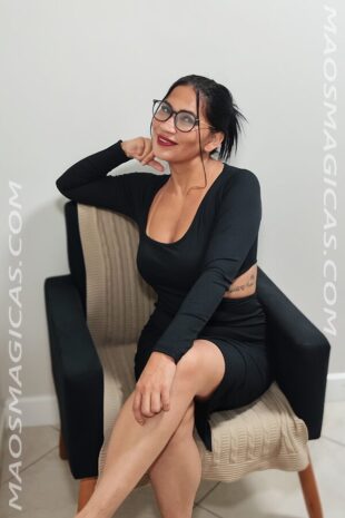 Massagem Mútua realizada por Ely, proporcionando conforto e bem-estar.